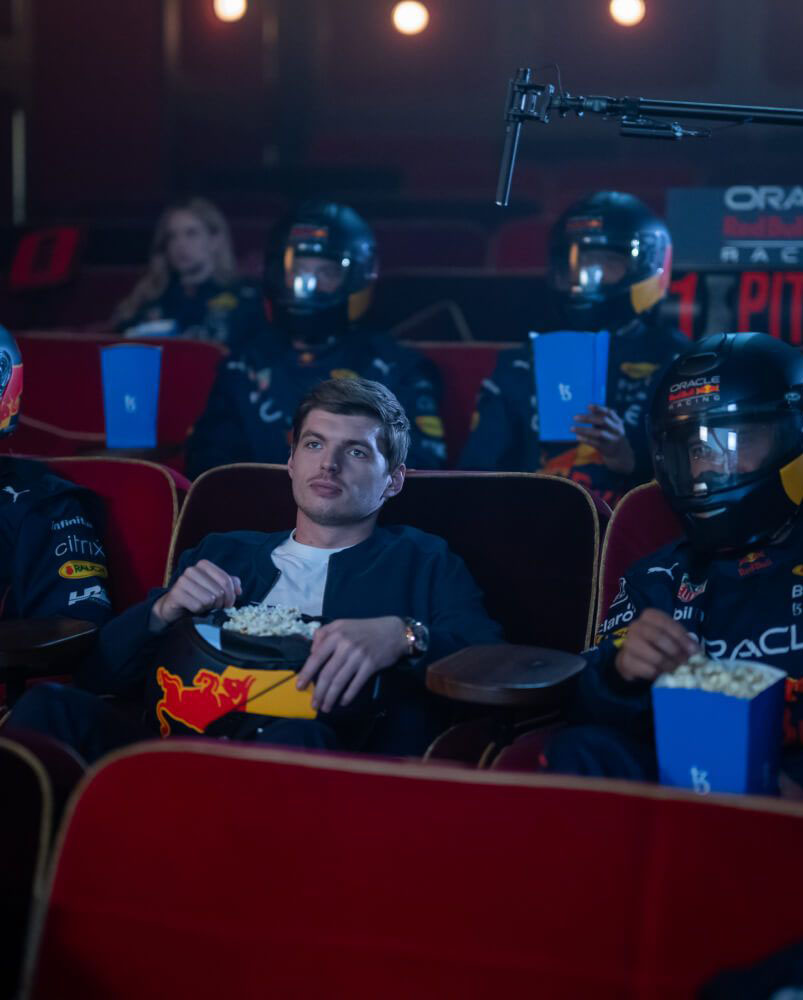 Max Verstappen cycling with Red Bull Racing team